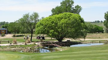 People golfing at he Rocky Ford Golf Course