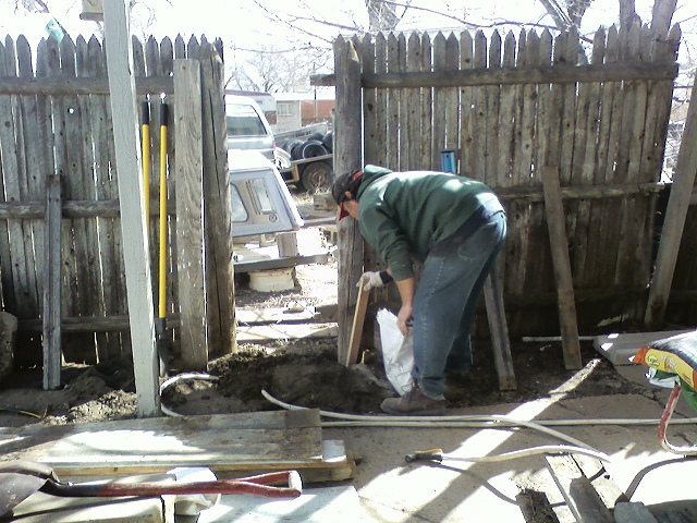 Coyote Moon's Carpenter-Ralph Gertsen working on a leaning fence